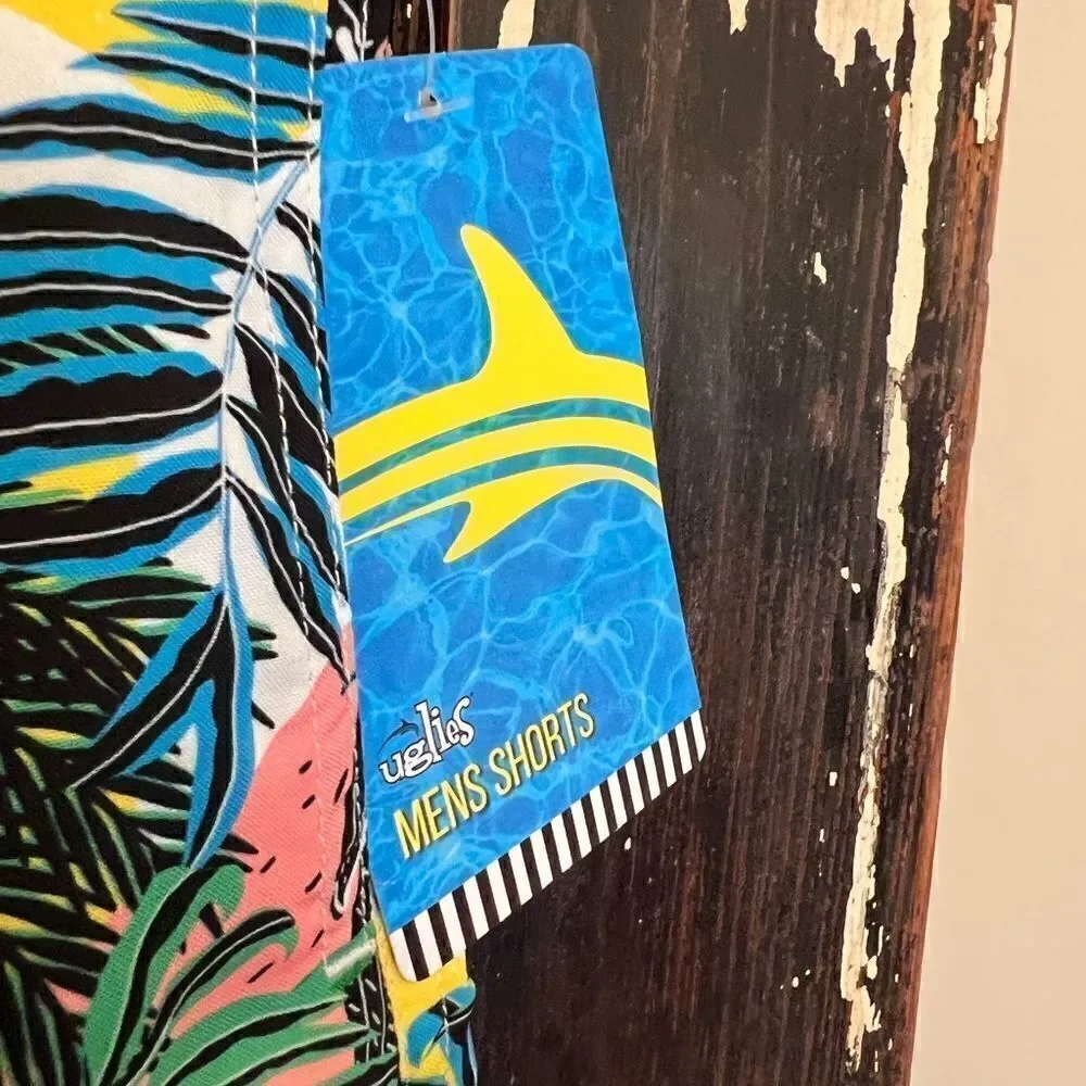 NWT Dolfin Uglies Board Shorts. Toucan tropical paradise. Size M.